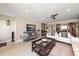 Living room with water views and comfortable seating at 400 Larboard Way # 106, Clearwater Beach, FL 33767