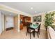 Bright dining area with glass-top table and kitchen view at 400 Larboard Way # 106, Clearwater Beach, FL 33767