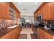 Updated kitchen boasts stainless steel appliances and a view to the dining area at 400 Larboard Way # 106, Clearwater Beach, FL 33767