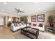 Open living room with comfortable seating and access to kitchen at 400 Larboard Way # 106, Clearwater Beach, FL 33767