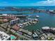 Aerial view of waterfront property, showcasing the building's location and surrounding area at 400 Larboard Way # 106, Clearwater Beach, FL 33767