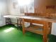 Workshop with workbench and storage at 231 Tarpon Ln, Oldsmar, FL 34677