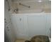 Walk-in tub with grab bars for accessibility at 231 Tarpon Ln, Oldsmar, FL 34677