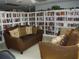 Relaxing community room with comfortable seating and bookshelves at 231 Tarpon Ln, Oldsmar, FL 34677