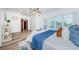 Spacious bedroom with king bed and access to private deck at 1142 Weybridge Ln, Dunedin, FL 34698