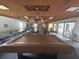Community room featuring a pool table and ample seating at 2587 Countryside Blvd # 6204, Clearwater, FL 33761