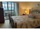 Bedroom with a double bed and access to a private balcony at 2587 Countryside Blvd # 6204, Clearwater, FL 33761