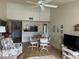 Open dining area adjacent to the living room at 2587 Countryside Blvd # 6306, Clearwater, FL 33761