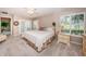 Large bedroom with sliding doors leading to the backyard at 1346 Hickory Moss Pl, Trinity, FL 34655