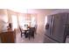 Cozy breakfast nook with table and chairs, adjacent to kitchen at 1346 Hickory Moss Pl, Trinity, FL 34655