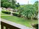 Enjoy the pool and lake view from your private balcony at 1955 Whitney Way, Clearwater, FL 33760