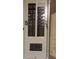 Close-up view of an electrical panel box with circuit breakers and labels at 8665 Mockingbird Ln, Seminole, FL 33777