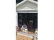 Exterior view of a shed, perfect for storage or a workshop, with a partial view of the contents inside at 8665 Mockingbird Ln, Seminole, FL 33777