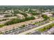 Aerial view of condominium complex showing building and parking at 4001 58Th N St # 16, Kenneth City, FL 33709