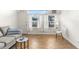 Bright living room with hardwood floors and window at 4001 58Th N St # 16, Kenneth City, FL 33709