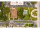 Aerial view of community amenities including shuffleboard court at 4001 58Th N St # 16, Kenneth City, FL 33709