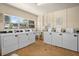 Shared laundry room with multiple washers and dryers at 4001 58Th N St # 16, Kenneth City, FL 33709
