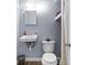 Small bathroom with toilet, sink, and shower at 4001 58Th N St # 16, Kenneth City, FL 33709