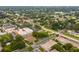 Aerial view showing apartment building location and surrounding area at 4001 58Th N St # 16, Kenneth City, FL 33709