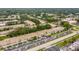 Aerial view of condominium complex showing building and parking at 4001 58Th N St # 16, Kenneth City, FL 33709