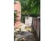 Small backyard with shed and partially visible fence at 8665 Mockingbird Ln, Seminole, FL 33777