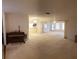Spacious living room with open floor plan and piano at 4714 Cavendish Dr, New Port Richey, FL 34655