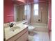 Bathroom with tub, shower, and vanity at 4714 Cavendish Dr, New Port Richey, FL 34655