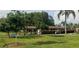 Community shuffleboard courts under covered area at 4714 Cavendish Dr, New Port Richey, FL 34655