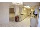 Open kitchen with a breakfast nook and access to the living room at 4714 Cavendish Dr, New Port Richey, FL 34655