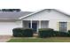Brick home with a covered entryway and well-maintained landscaping at 4714 Cavendish Dr, New Port Richey, FL 34655