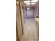 Kitchen with white cabinets and tiled floor at 4714 Cavendish Dr, New Port Richey, FL 34655
