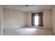 Spacious bedroom with ceiling fan and window coverings at 4714 Cavendish Dr, New Port Richey, FL 34655