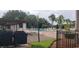 Community pool with patio furniture and grilling area at 4714 Cavendish Dr, New Port Richey, FL 34655