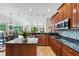 Modern kitchen with stainless steel appliances and a large island at 11519 Belle Haven Dr, New Port Richey, FL 34654