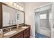Well-appointed bathroom with double vanity and a separate shower and tub at 11519 Belle Haven Dr, New Port Richey, FL 34654
