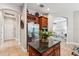 Spacious kitchen features stainless steel appliances and a large island with seating at 11519 Belle Haven Dr, New Port Richey, FL 34654