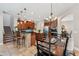 Well-equipped kitchen with breakfast bar and dining area at 11519 Belle Haven Dr, New Port Richey, FL 34654
