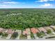 Community overview showcasing a variety of homes and lush green spaces at 11519 Belle Haven Dr, New Port Richey, FL 34654