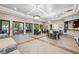 Bright and spacious community room with plenty of seating and large windows at 11519 Belle Haven Dr, New Port Richey, FL 34654