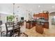 Large kitchen island open to the Gathering room with a view of the backyard at 11519 Belle Haven Dr, New Port Richey, FL 34654
