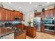 Spacious kitchen with stainless steel appliances and ample cabinetry at 11519 Belle Haven Dr, New Port Richey, FL 34654