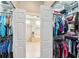Large walk-in closet with ample shelving and hanging space at 11519 Belle Haven Dr, New Port Richey, FL 34654