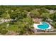 Aerial view of community pool and surrounding townhouses at 103 Brigadoon Dr, Clearwater, FL 33759