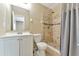 Clean bathroom with tub, shower, and vanity at 103 Brigadoon Dr, Clearwater, FL 33759