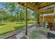 Private backyard with grassy area and patio at 103 Brigadoon Dr, Clearwater, FL 33759