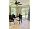 Dining room with sliding glass doors to backyard at 6196 Coralberry Ter, Port Charlotte, FL 33981