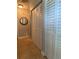 Hallway with built-in storage and tile flooring at 6196 Coralberry Ter, Port Charlotte, FL 33981