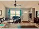 Living room with comfortable seating and access to kitchen at 6196 Coralberry Ter, Port Charlotte, FL 33981