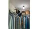 Well-lit spacious closet with hanging rods at 6196 Coralberry Ter, Port Charlotte, FL 33981