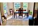 Spacious dining area with wood table and chairs at 6196 Coralberry Ter, Port Charlotte, FL 33981